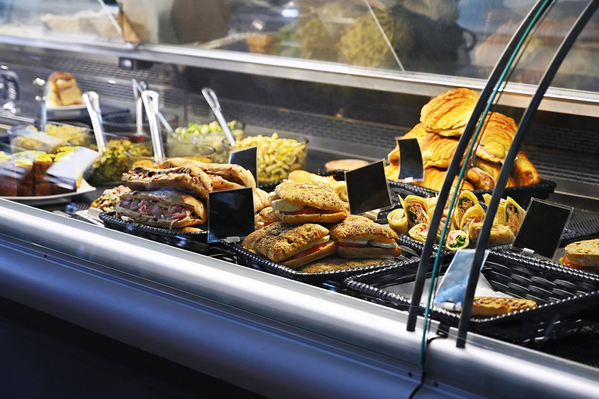 Deli display with sandwiches and food